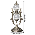 Hourglass dimensions: 21.6cm high, 8.4cm base